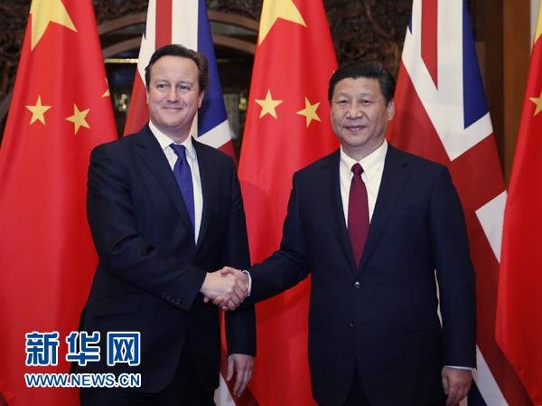 12月2日，国家主席习近平在北京钓鱼台国宾馆会见英国首相卡梅伦。 新华社记者 鞠鹏 摄
