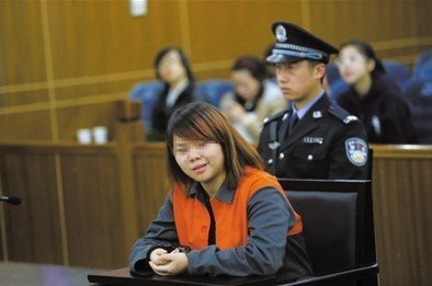 2013年4月3日，被告人小萍在法庭上受审。新京报记者 王贵彬 摄