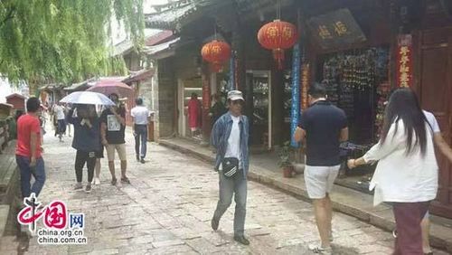 丽江古城大部分商户关门抗议围城强收“古维费”