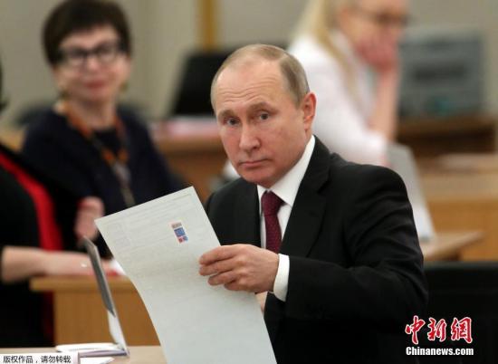 当地时间2018年3月18日，俄罗斯莫斯科，俄罗斯总统普京参加俄罗斯2018年总统大选投票。
