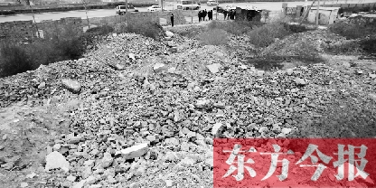昨日，郑州市107辅道花园口镇大庙村，绵延数公里的城中村拆迁后遗留的建筑垃圾