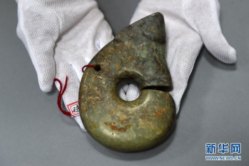 红山文化遗址盗掘案追回文物1168件 图片来源：新华网