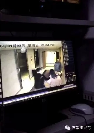 一女子在酒店被陌生男子拖拽。    视频截图