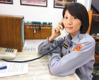 　　27岁的台湾高雄市盐埕区女警王文君，留一头俏丽短发，身高175公分。《联合报》图